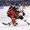 BUFFALO, NEW YORK - JANUARY 2: Canada's Jake Bean #2 battles with Switzerland's Dominik Egli #27 during quarterfinal round action at the 2018 IIHF World Junior Championship. (Photo by Matt Zambonin/HHOF-IIHF Images)

